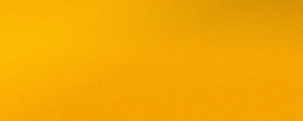 Fototapeta premium Luminous golden tones blend smoothly with a subtle grainy texture, creating a warm and cheerful abstract background perfect for marketing, banners, and festive themes.