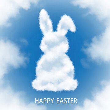 Easter bunny made of clouds in blue sky with happy Easter message