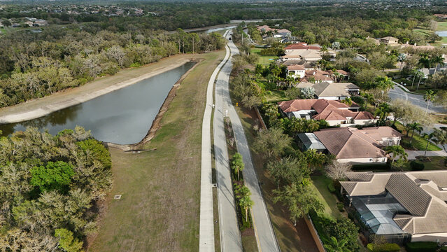 aerial of HIdden River Trail street, park-like cut through from Lorraine Road to Lakewood Ranch Boulevard, Bradenton, Florida