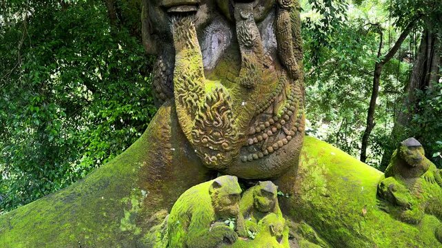 Ancient statue in Ubud Monkey Forest Bal