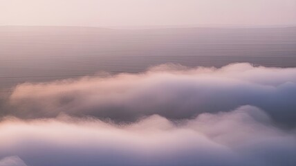 Fototapeta premium Above the clouds scenic landscape with misty ethereal morning atmosphere