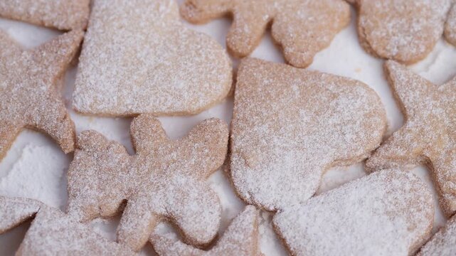 Sweet tasty treats, Delightful baked sugar confections, Decorative cookies with powdered sugar accents, Freshly made heartshaped cookies dusted with fine icing sugar