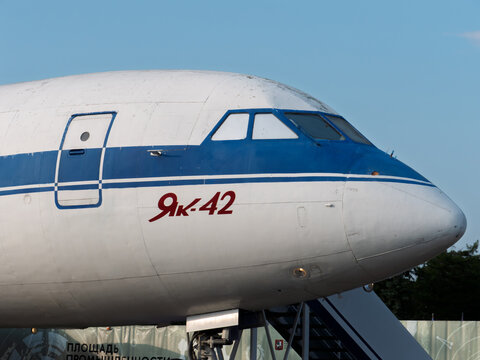 Historic Yak-42 Aircraft on Display Against Blue Sky