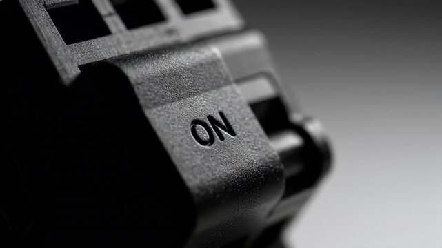 Close Up Black Plastic ON Power Toggle Switch Detail