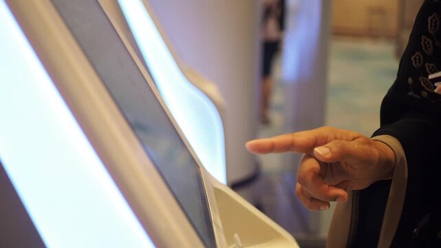 Using a touchscreen display at a kiosk in a airport