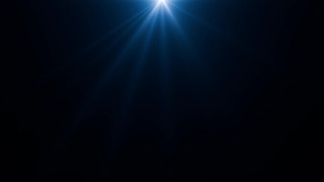 Top center blue rays light 4k loop animation. light lens flare overlay video. sun rays or god bless rays on black screen. sun burst lens flare Chroma Key. Optical Lens flare shining bright.