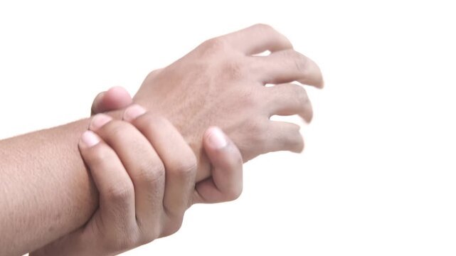 Hand holding wrist in pain or discomfort motion footage