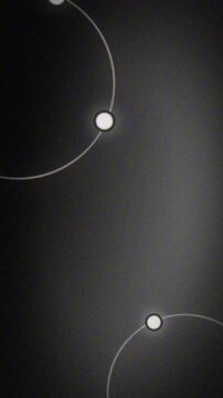 Circles featuring luminous white spheres are arranged on a dark gradient background with ample copy space.