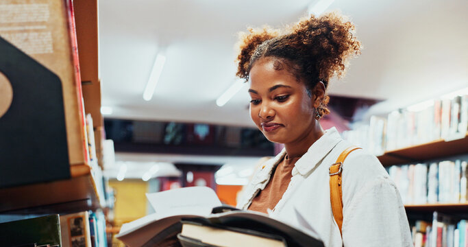 Student, girl and reading book at shelf on campus for research, exam info or knowledge. College, african person or check course resources in library for thesis citation, literary interest or learning