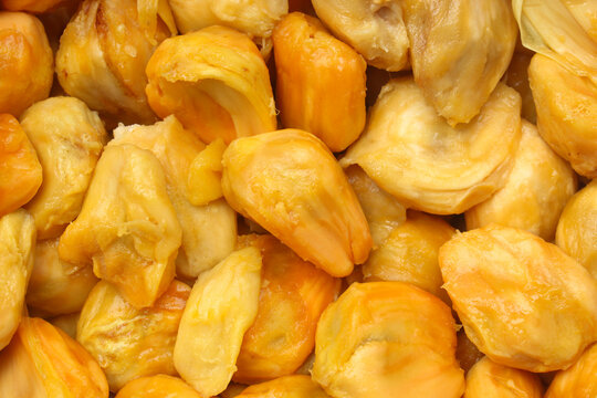 The texture of ripe cempedak fruit flesh is bright yellow