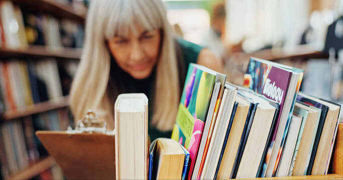 Librarian, books or woman with clipboard in library for stock inspection, auditing material or info. Admin, mature worker or checklist at bookshelf for inventory control, sampling or resource catalog