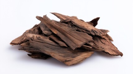 Aquilaria malaccensis bark chips isolated on white background