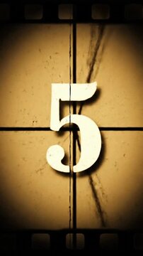 Counting down from eight to zero with old film style countdown clock and movie frame background