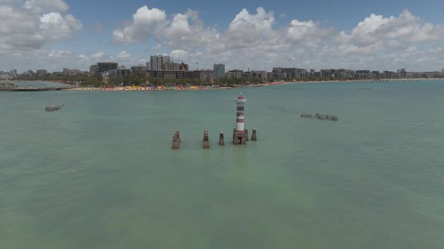 Aerial drone video of a beach in Brazil, Alagoas state, on Ponta Verde beach in the city of Maceio.