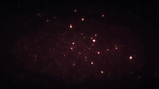 Abstract dark background with scattered luminous bokeh of reddish and orange hues