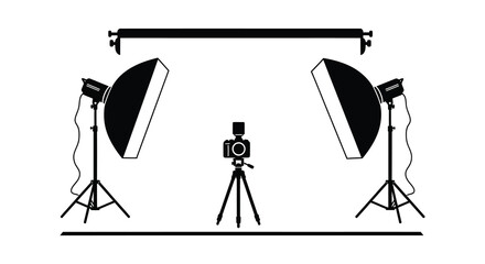 A studio setup featuring two softbox lights a camera on a tripod and a boom arm presented as a silhouette © jivect02