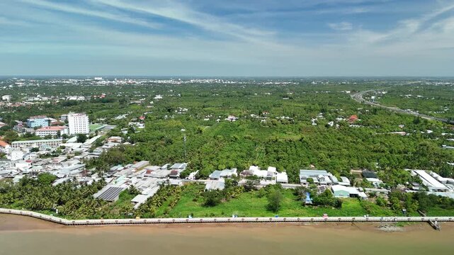 Ward 6, Cao Lanh City, Dong Thap, Southwest Vietnam &ndash; 4K aerial drone footage of rural houses, fruit farms, transportation and traffic in Mekong River Delta