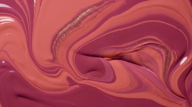 Abstract swirls of creamy pink and purple liquid with gold glitter accents