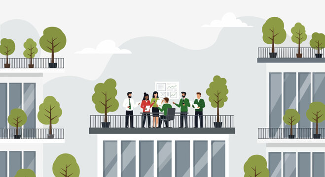 Diverse team meeting on office balcony with green plants, brainstorming ideas