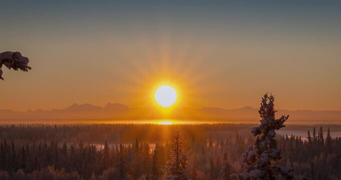 Arctic Solstice Sun &mdash; Journey over the Alaska Mountain Range