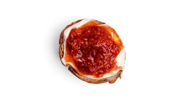 Toast with adjika isolated on white background. High quality photo