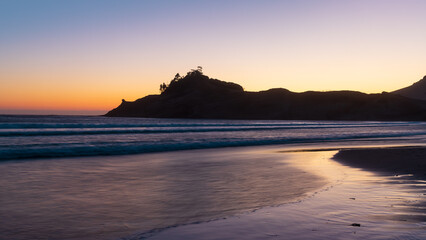 Cape Kiwanda, Oregon beach sunset with pacific ocean waves