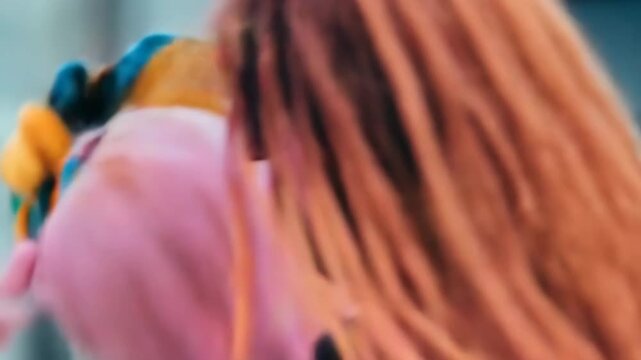 Confident multicultural women with vibrant, dyed hair and unique styles looking at the camera
