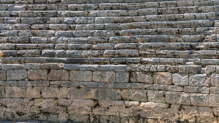 The stadium is located in the ancient city of Perge in Turkey. An ancient city founded during the Trojan War. Ruins of an ancient stadium. The stands are made of hewn stone blocks. © Eduard Belkin