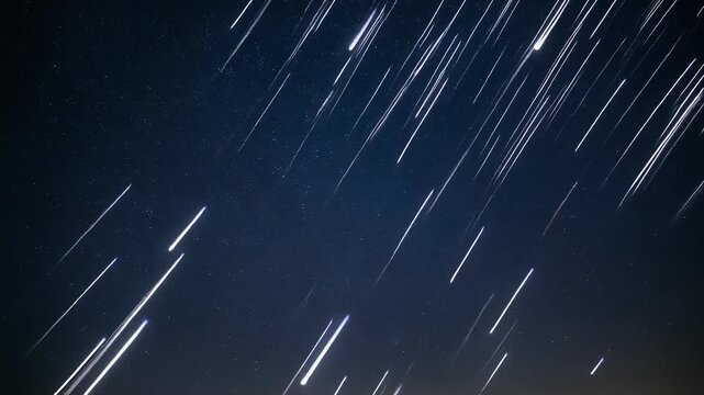 Star trails captured in a long exposure photograph against a dark night sky