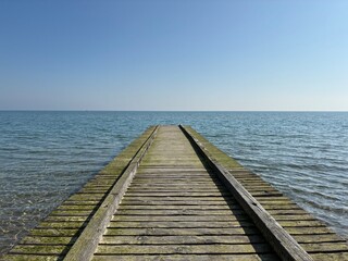 wooden bridge over the sea