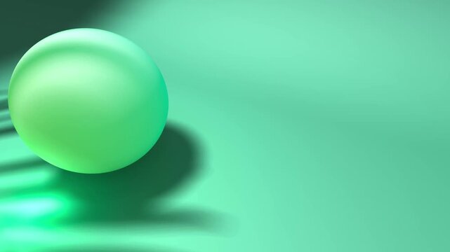 Close up of a large green sphere on a mint surface with a leaf shadow across the bottom representing modern architectural shapes and sustainable brand identity