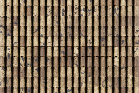 Yellow sand colored barrel roof tile texture top view for coastal architecture and villa construction