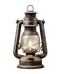 An old rusty lantern with a lit candle inside on a table
