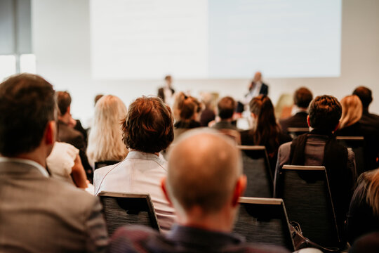Interview and round table discussion at business convention and presentation. Audience at the conference hall. Business and entrepreneurship symposium.