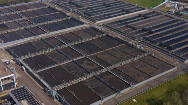 Drone footage of Milan urban wastewater system, showing treatment facilities that support city life and maintain sanitation and water quality.