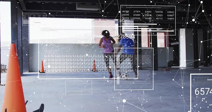 Woman dribbling, man defending contesting ball shifting right during soccer training, HUD tracking