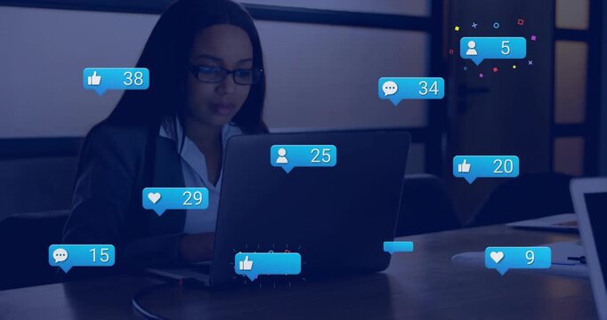 Woman typing on laptop initial blue bubble sparking social bubbles spreading out boosting marketing