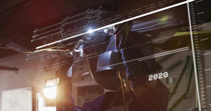 Female technician inspecting beneath vehicle in auto bay, handheld torch activating HUD timeline