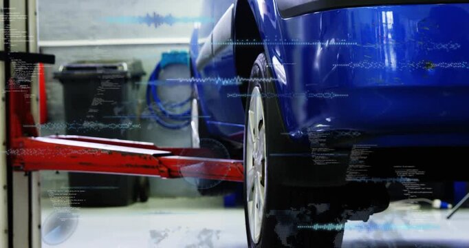 Red lift arm sliding under car, raising rear wheel in auto garage, overlays highlighting inspection