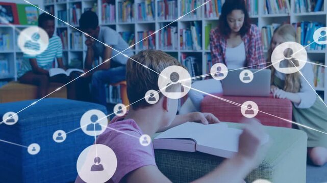 Boy in pink tee flipping textbook page creating growing education network overlay in study area