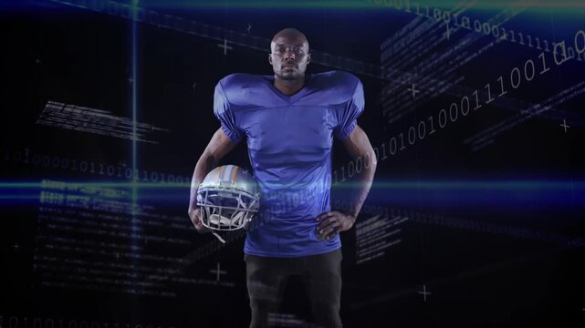 Standing adult player adjusting helmet in studio for promo as HUD appears, blue jersey, black pants