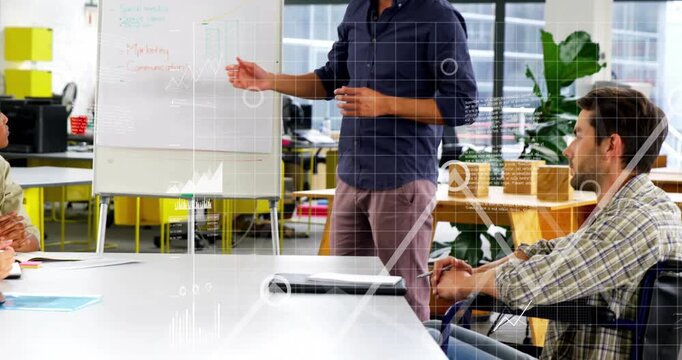 Presenter starting speech, gesturing to flipchart while data overlays appearing and showing trends