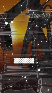 Vertical video: Pumpjack standing while camera panning oil HUD rising with nodes, bars, monitoring