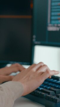 Vertical Screen : Closeup young adult Asia female freelance type write prompt AI bot IT app program nomad, video game terminal with coding language, user interface, designer, big data center computer.