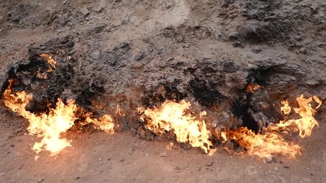 A close up view of the eternal natural gas fire at Yanar Dag on the Absheron Peninsula near Baku Azerbaijan showcasing a unique geological phenomenon