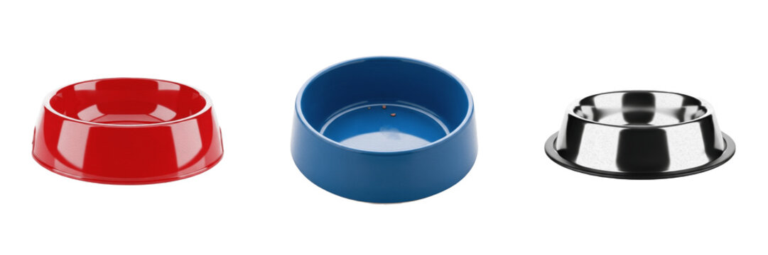 Set of empty pet bowls in red, blue, and metallic silver isolated on white background