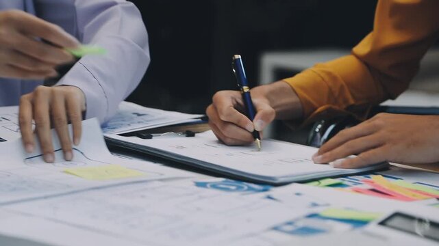 team of UI UX web designer are working together to develop mobile responsive websites with UI UX front end designer previews