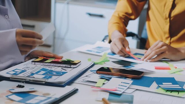 team of UI UX web designer are working together to develop mobile responsive websites with UI UX front end designer previews