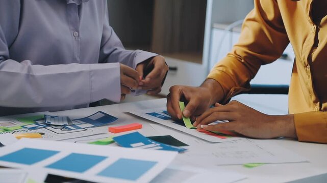 team of UI UX web designer are working together to develop mobile responsive websites with UI UX front end designer previews