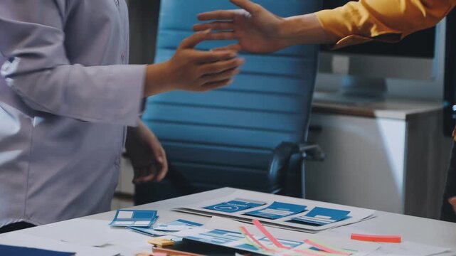 team of UI UX web designer are working together to develop mobile responsive websites with UI UX front end designer previews